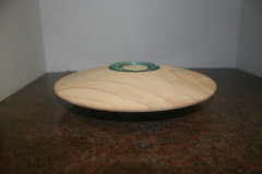 Item E21 side view Sand blaster Elm candle holder texture looks like a sand dollar 2 1/2" H (6.5cm) X 9 1/2"W (24cm)  $45.00
